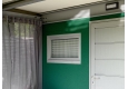 GARDEON® Záhradný domček s dverami Hörmann, oknom, svetlíkom a prístreškom vpredu